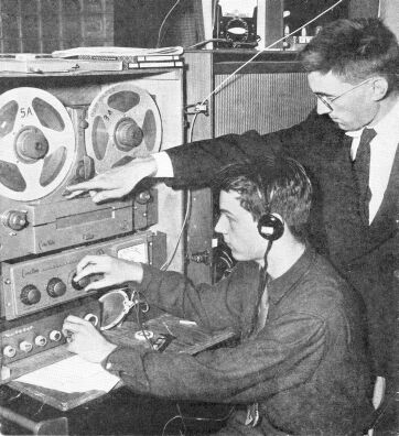 Fred Imm K8EVB at the controls to make a dub,
onto a 7-inch reel machine (not shown)
as Mike Stimac W8KTZ starts the tape.